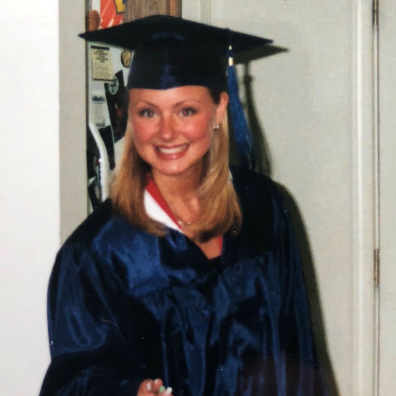 kellie-b1-i6 A woman wearing a graduation outfit
