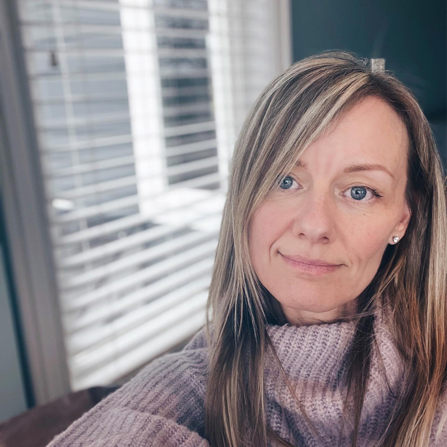 A woman wearing a sweater